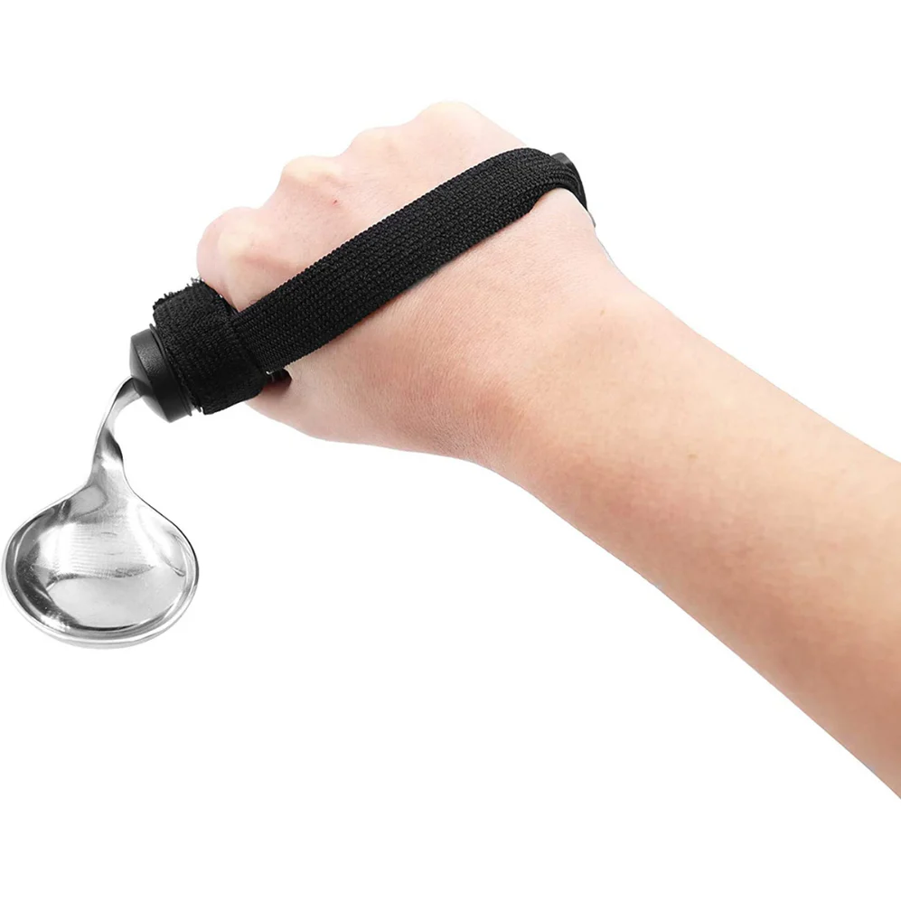 cuchara ergonomica sujeta a la mano mediante velcro para mayor control